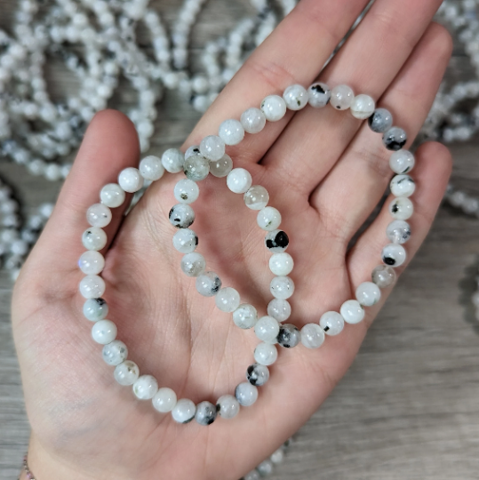 Stretchy bracelet made from 6mm round rainbow moonstone beads