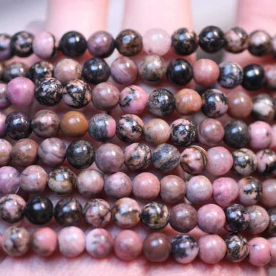 Stretchy bracelet made from 6mm round rhodonite beads