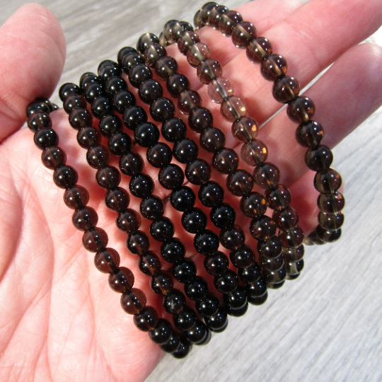 Stretchy bracelet made from 6mm round smoky quartz beads