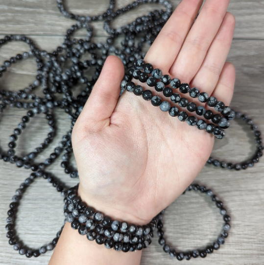 Stretchy bracelet made from 6mm round snowflake obsidian beads