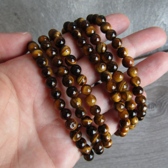 Stretchy bracelet made from 6mm round tigers eye beads