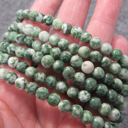 Stretchy bracelet made from 6mm round tree agate beads