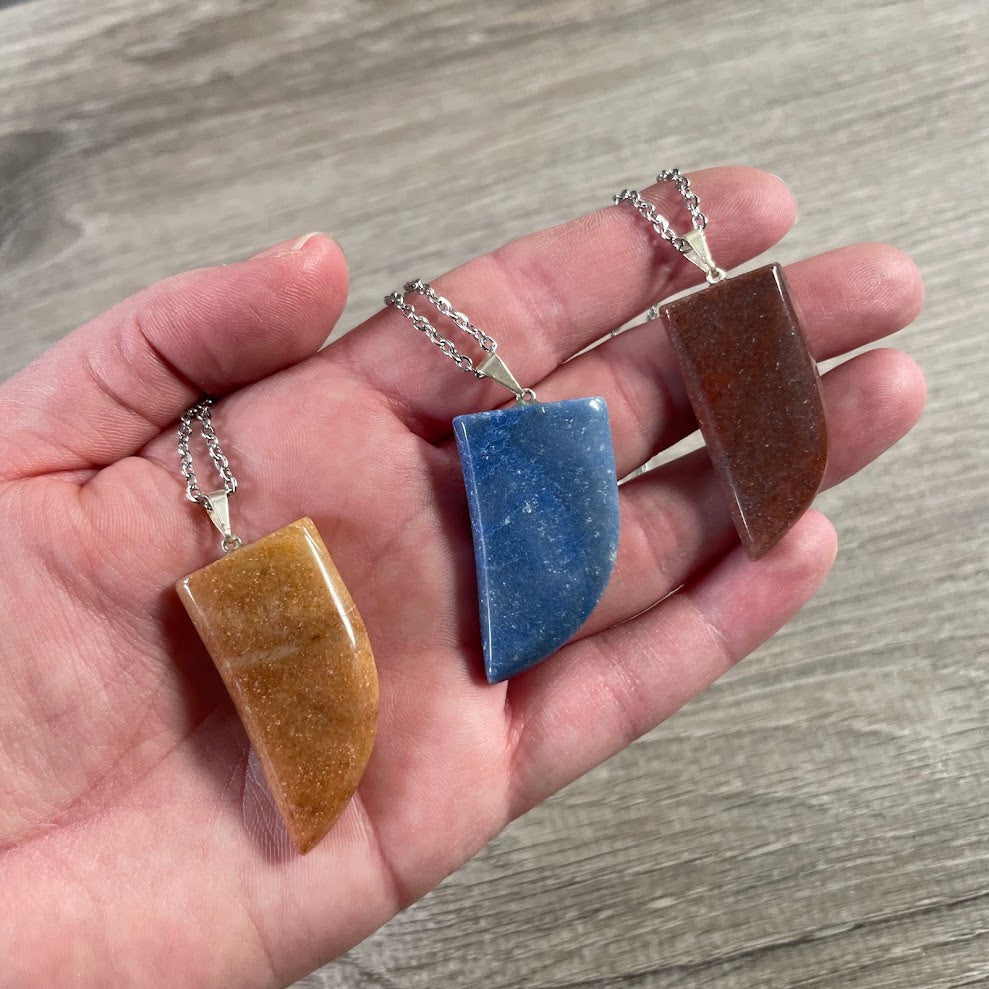 Wholesale crystal claw pendant for boutiques and gift shops