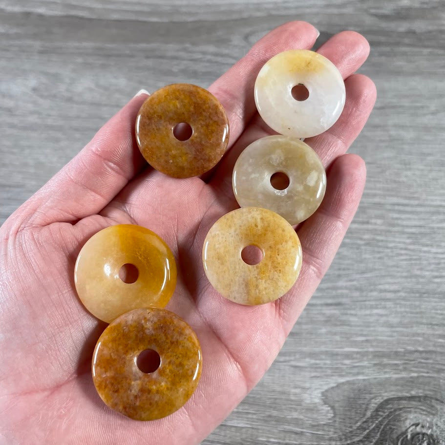 golden healer metaphysical pi stone donut bulk crystals