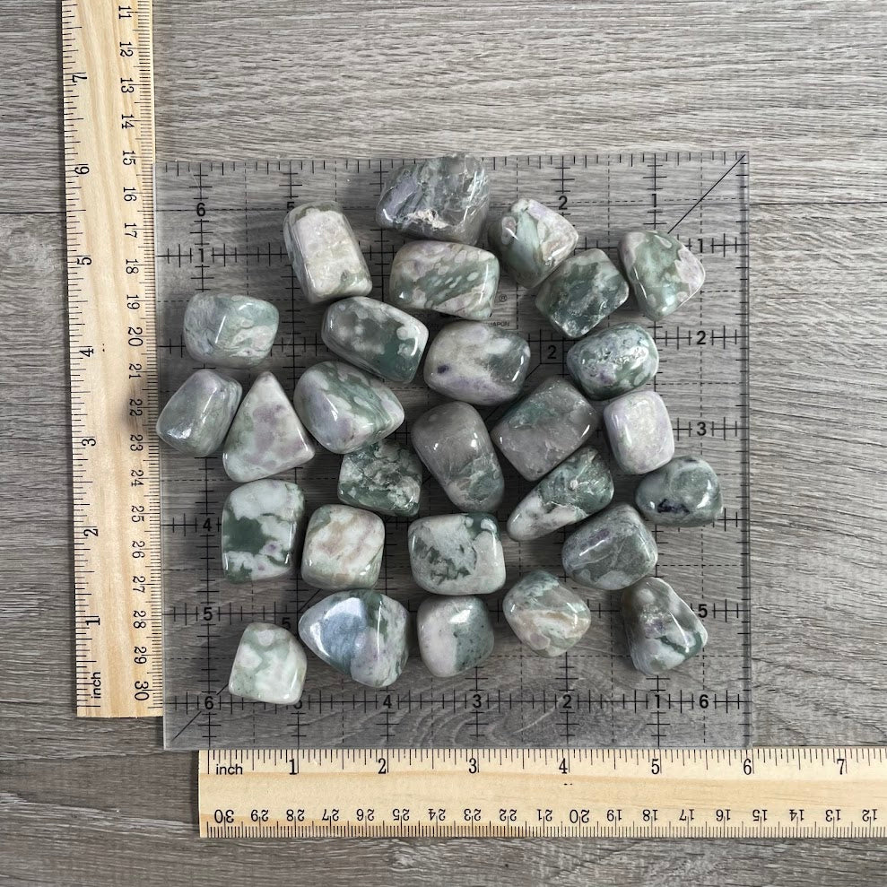 Peace Jade tumbled gemstone assortment with natural green and cream coloring