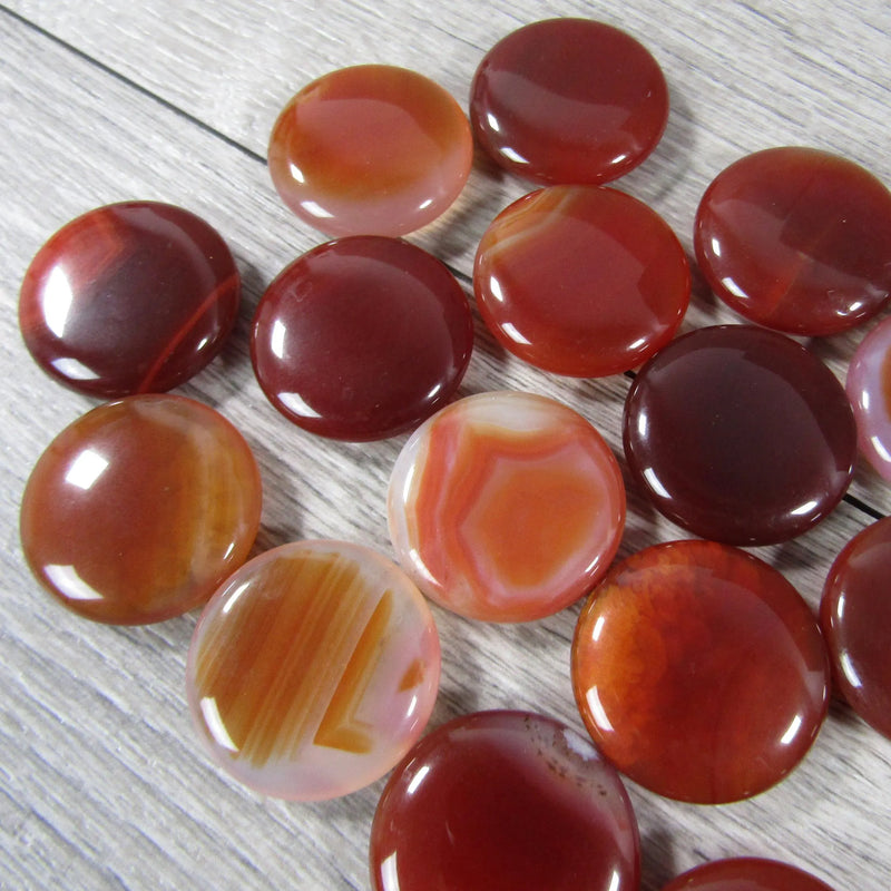 Round Carnelian flat gemstone disk for chakra alignment