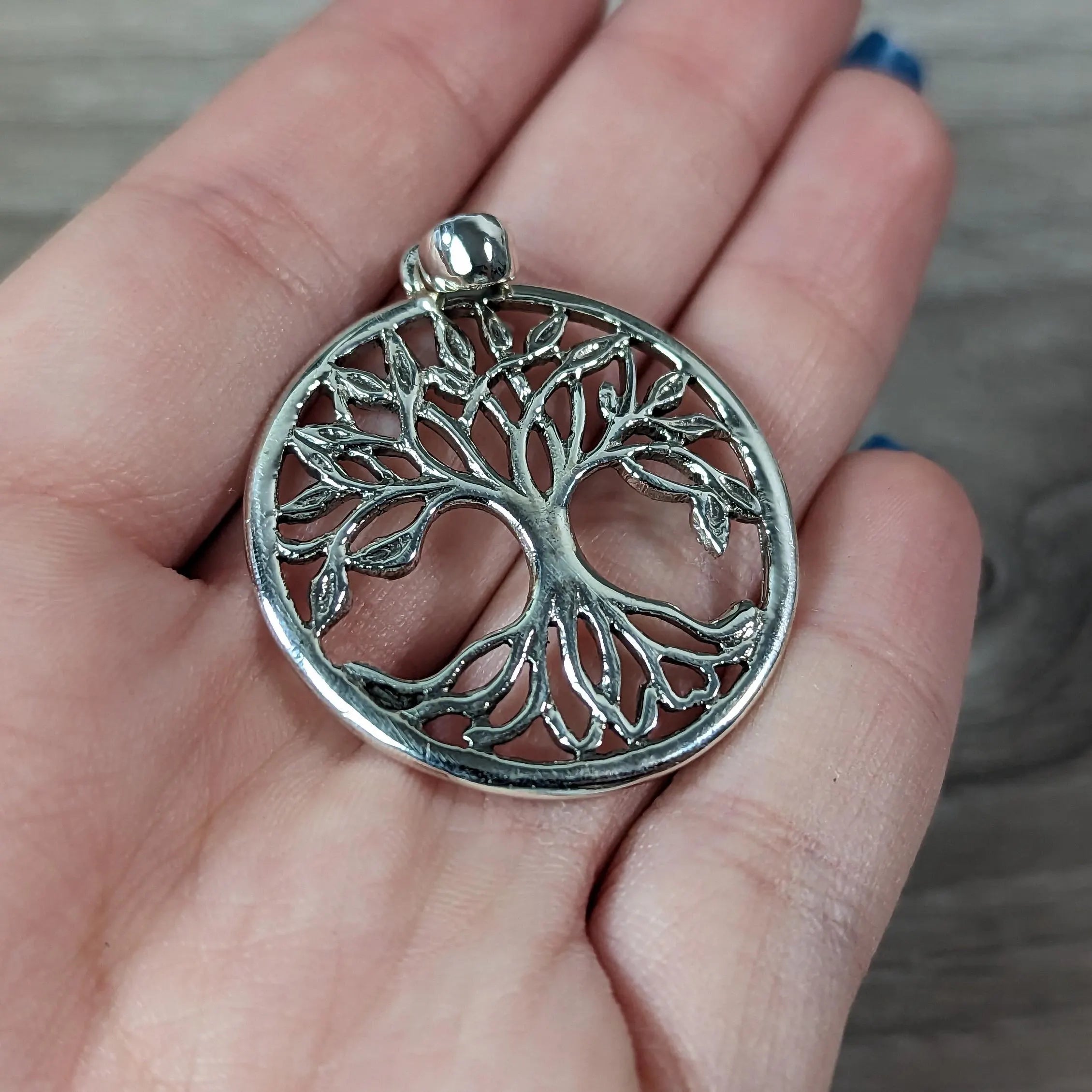 Round Tree of Life pendant.