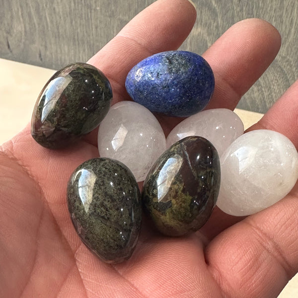 a bunch of gemstones mini robin eggs in hand