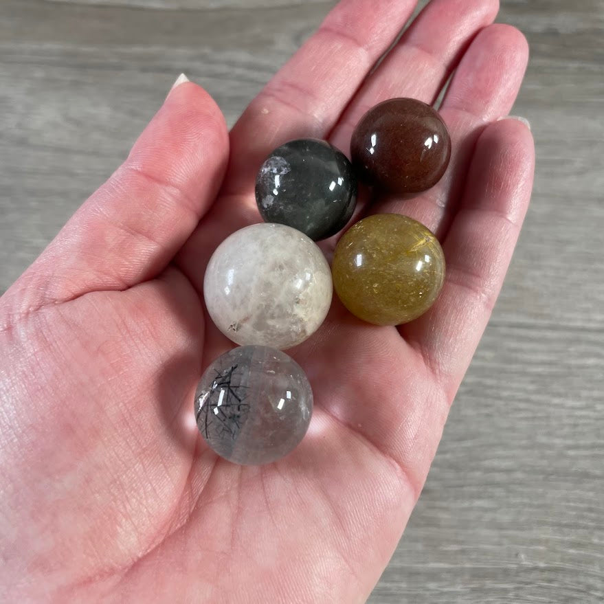 Rutilated quartz small sphere with natural rutile inclusions wholesale gemstone crystal