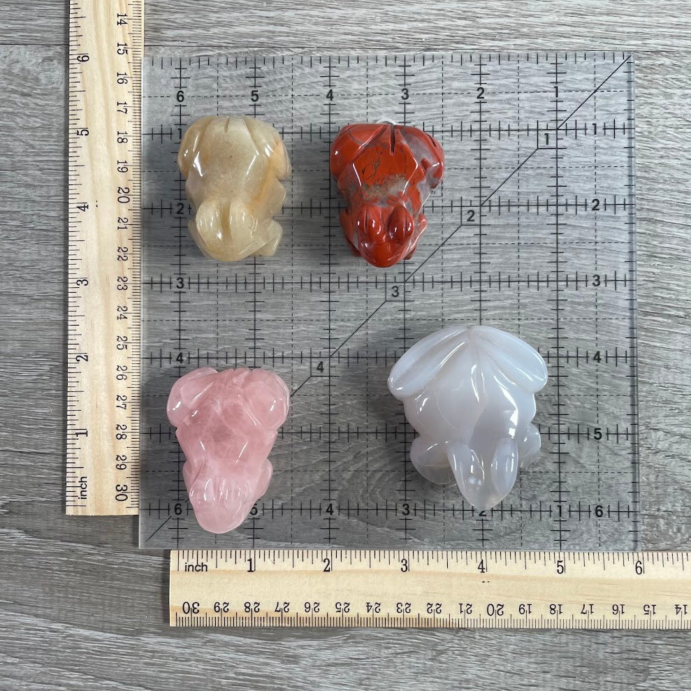 Assorted gemstone frog figurines carved from natural crystals for wholesale shops