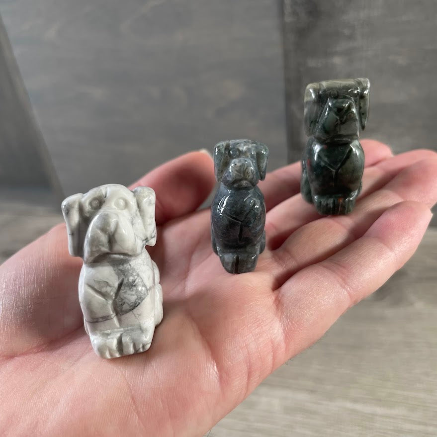 Medium carved stone dog figurine for crystal décor, animal collections, and gift shop displays