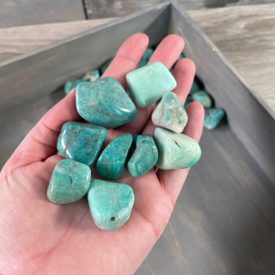 Bulk Amazonite polished crystals with turquoise green colors and natural white mineral patterns for crystal shops