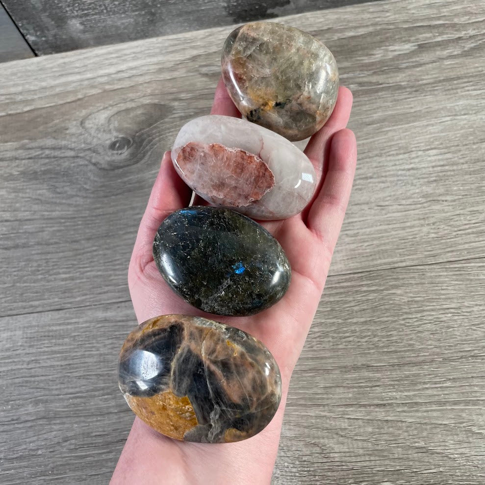 Assorted polished gemstone palm stones for wholesale metaphysical and gift shop supplies