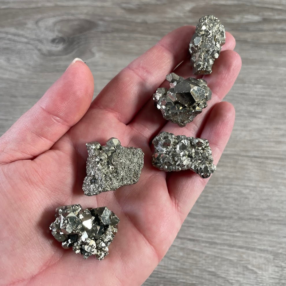 Raw pyrite crystal cluster with natural metallic gold formation