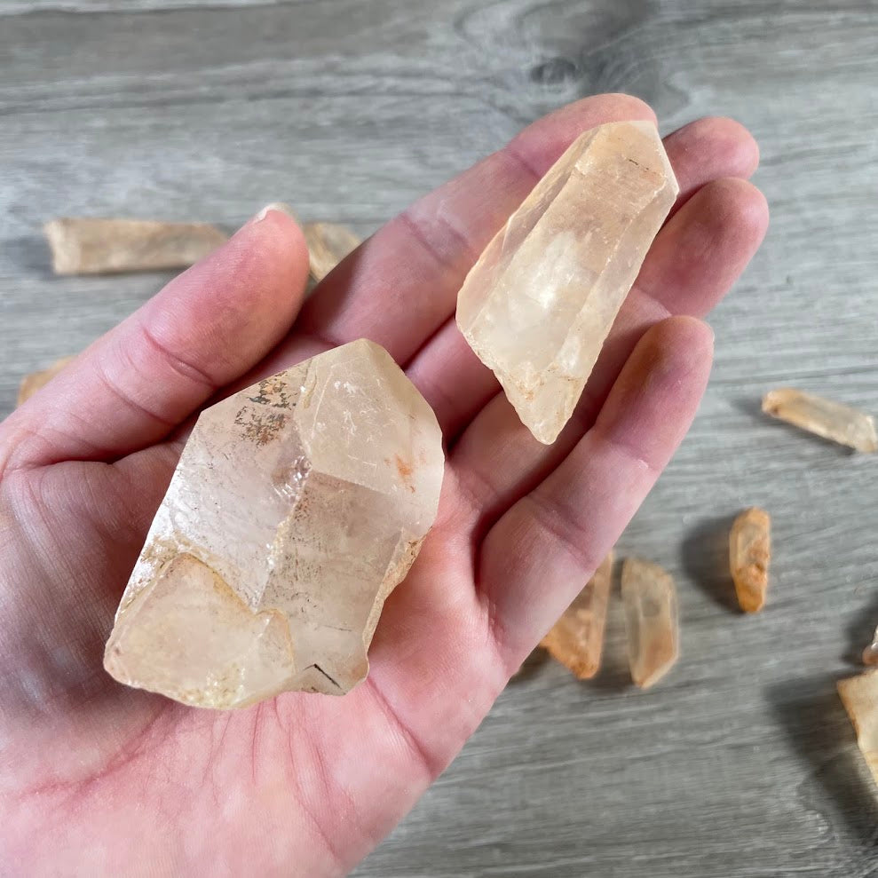 Natural Tangerine Quartz crystal points with warm orange iron mineral coating