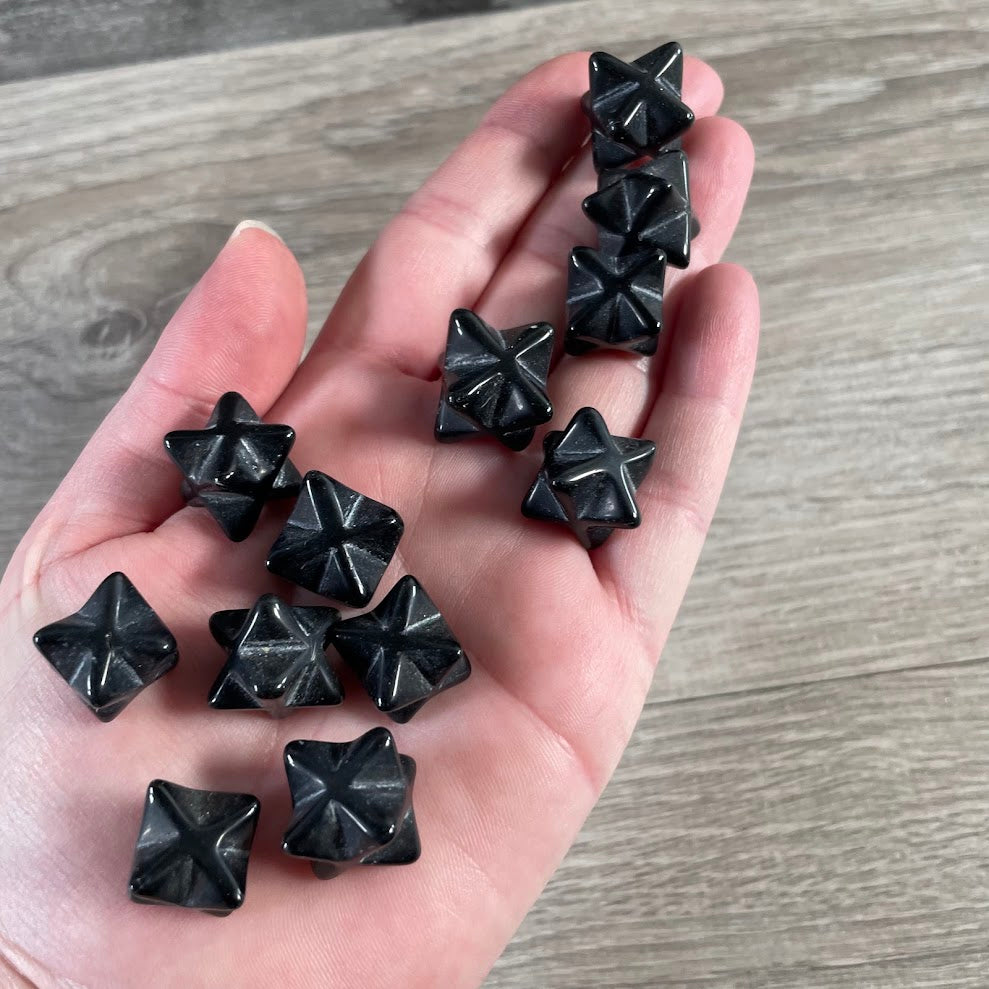 Obsidian natural gemstone Merkaba stars carved in Brazil with polished sacred geometry designs