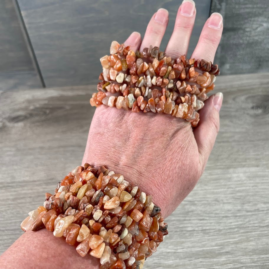 Wholesale orange aventurine gemstone chip bracelets made with polished natural crystal stones