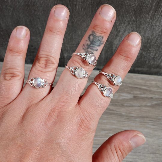 Sterling silver ring with celtic trinity knot band and Rainbow Moonstone center stone