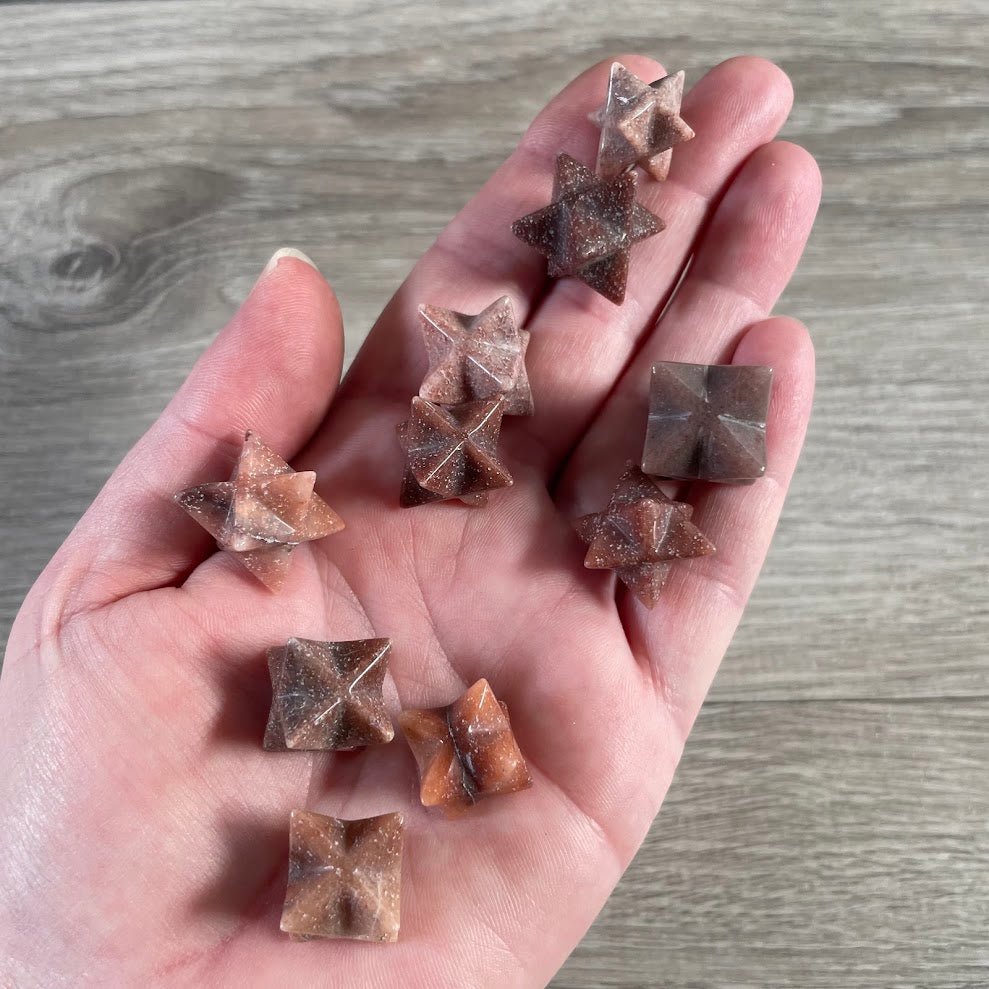 Red aventurine Brazilian Merkaba carved crystals in assorted polished gemstones for wholesale crystal shops