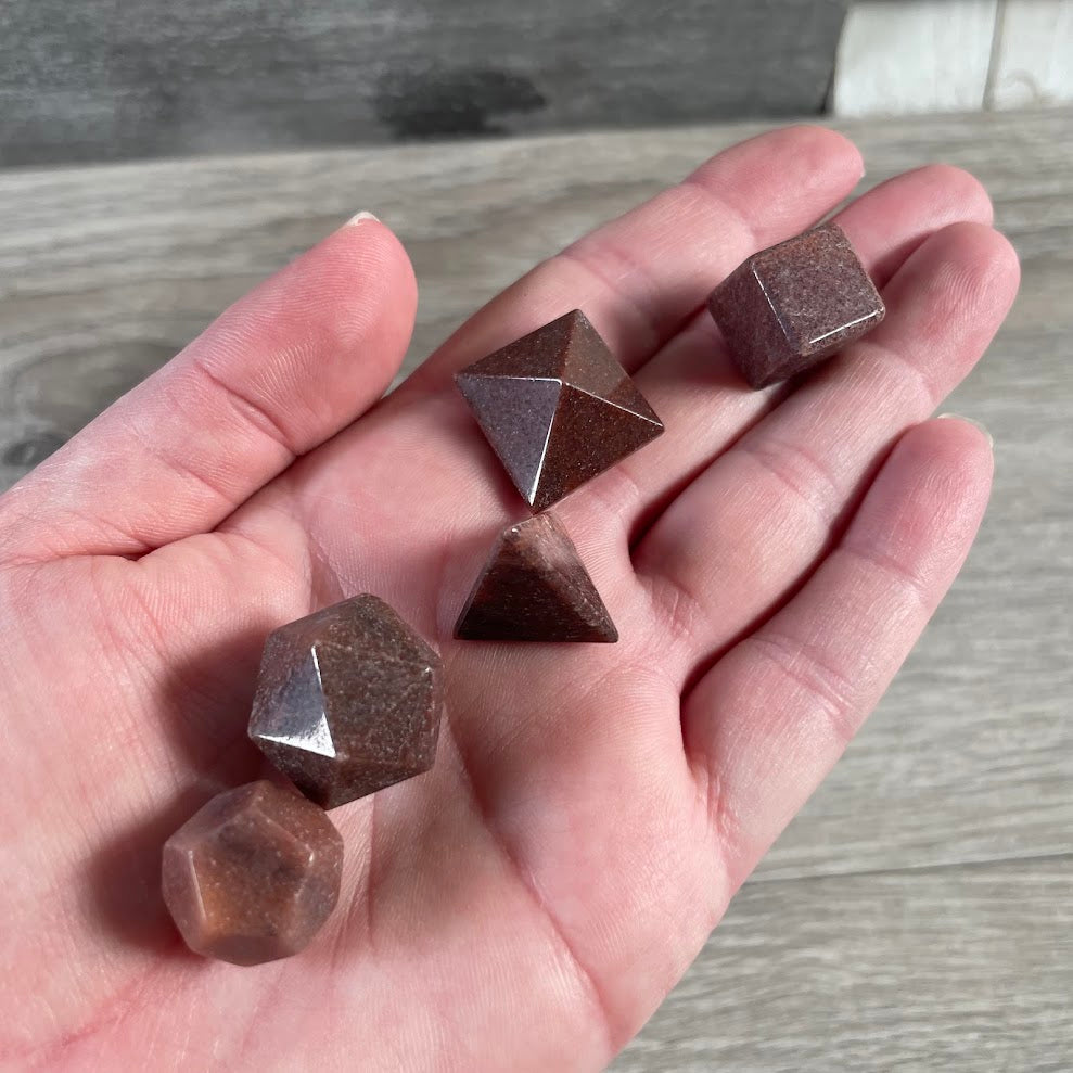 Wholesale red aventurine sacred geometry crystal set with carved gemstone shapes