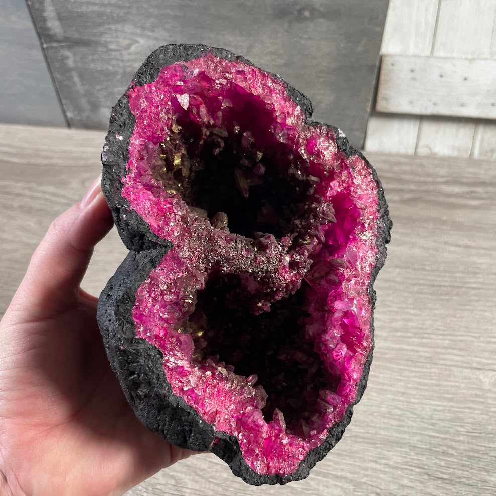 Bulk colorful geode pairs with natural crystal centers for gift shops and metaphysical stores