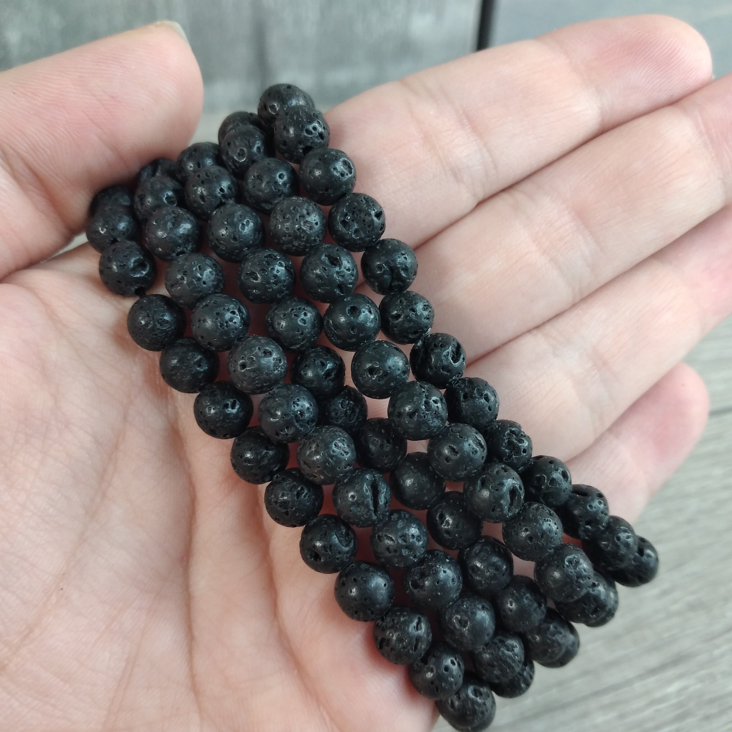 Stretchy bracelet made from 6mm round lavastone beads