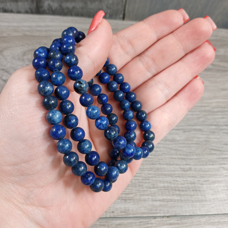 Stretchy bracelet made from 6mm round lapis beads