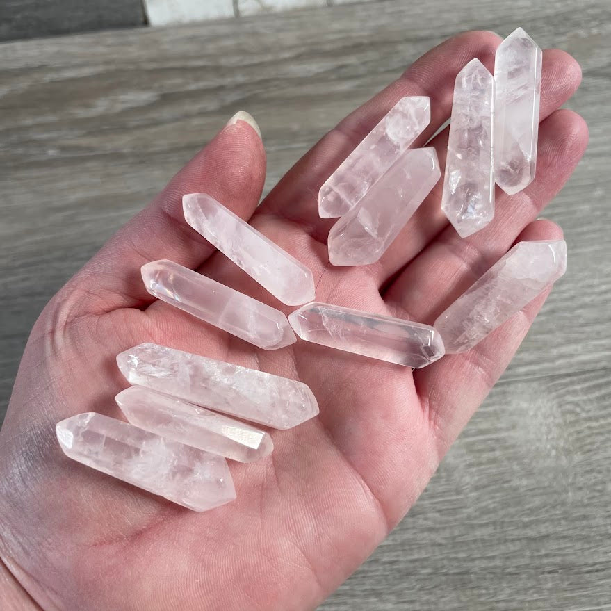 rose quartz double terminated gemstone crystal points handmade in Brazil for wholesale resale.