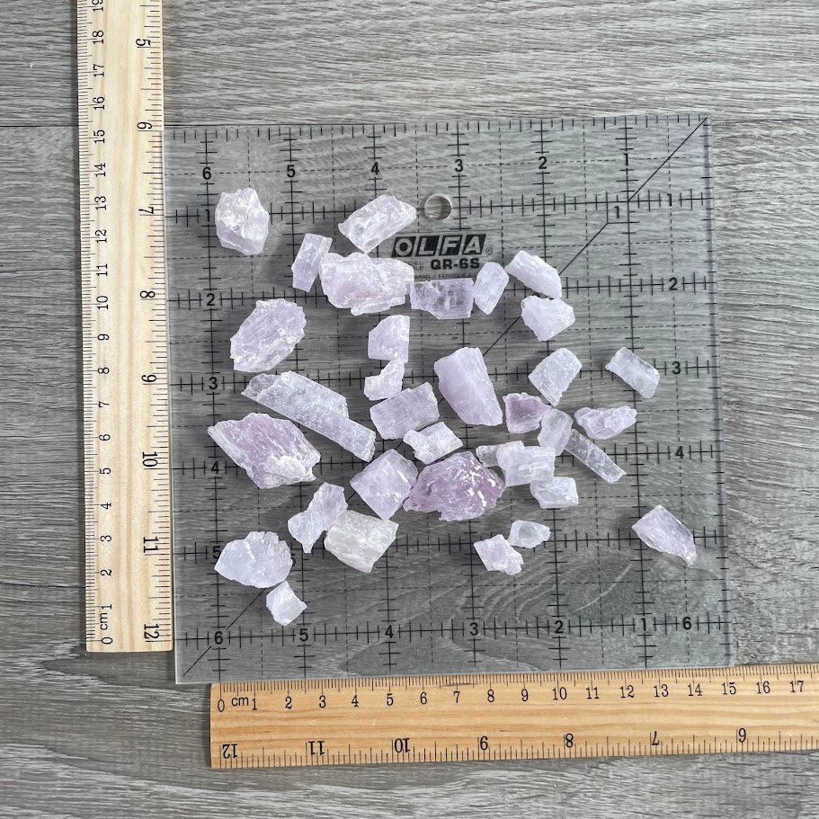 Pink kunzite raw crystal pieces sold by weight in 4oz bags