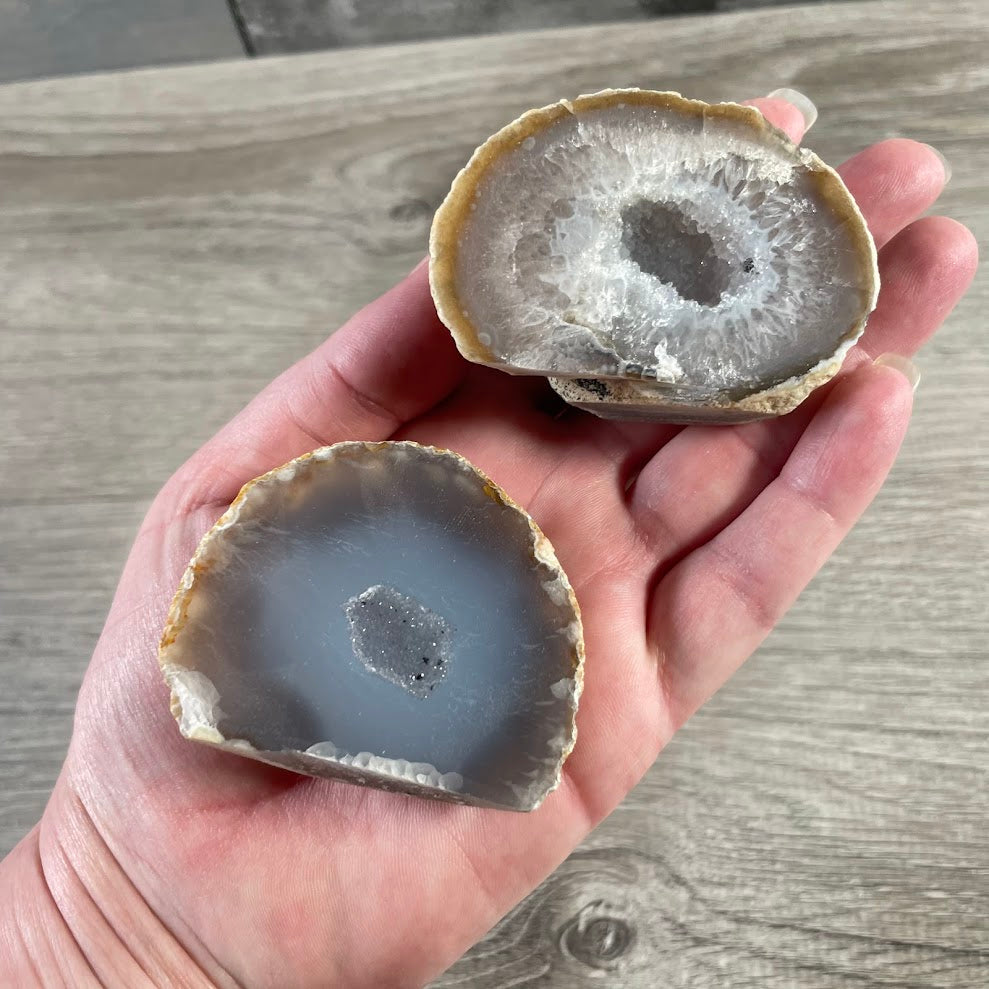 Polished agate crystal with sparkling druzy mineral formation