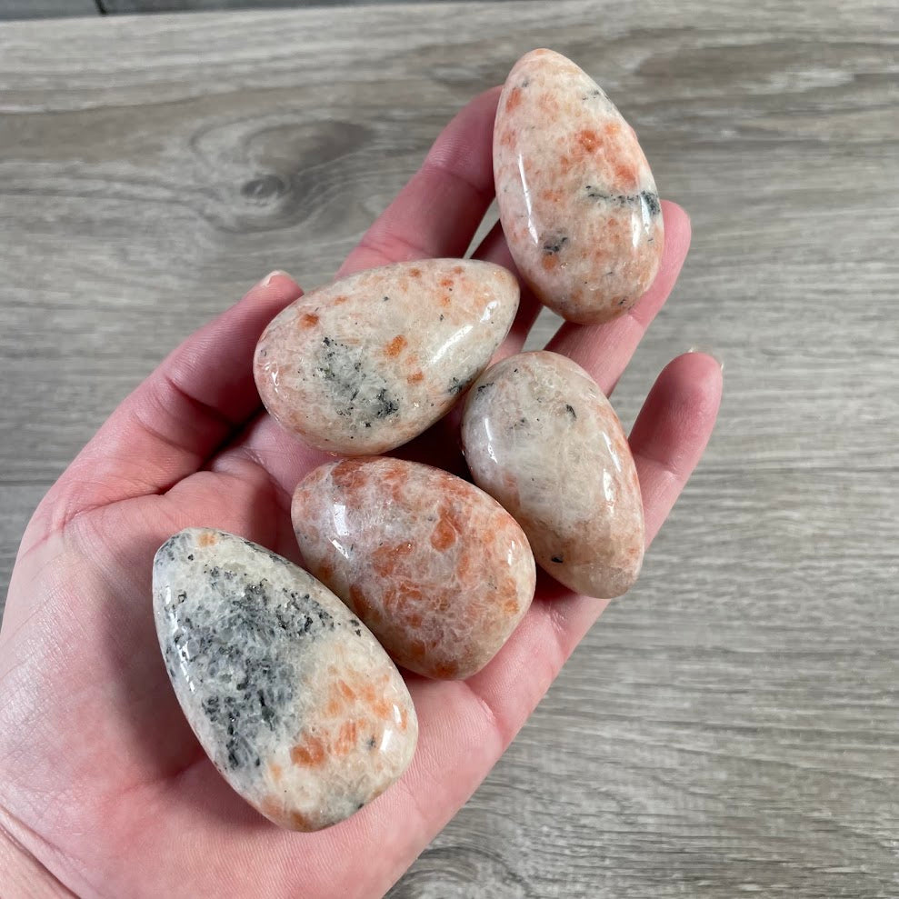 Wholesale sunstone crystal palm stones assorted natural polished gemstones