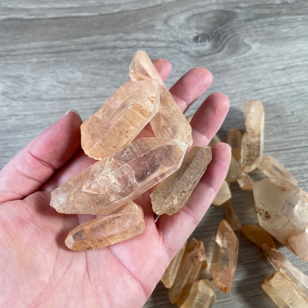 Wholesale natural Tangerine Quartz points raw iron-stained quartz crystals