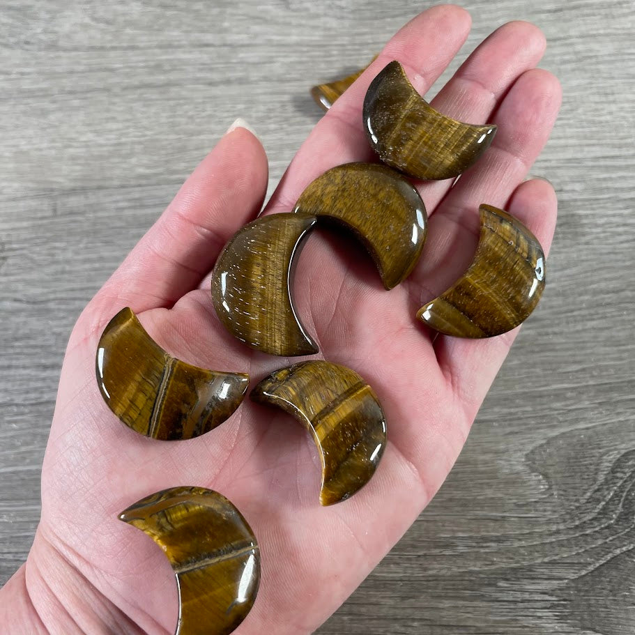 Hand carved tiger eye natural gemstone crescent moon from Brazil