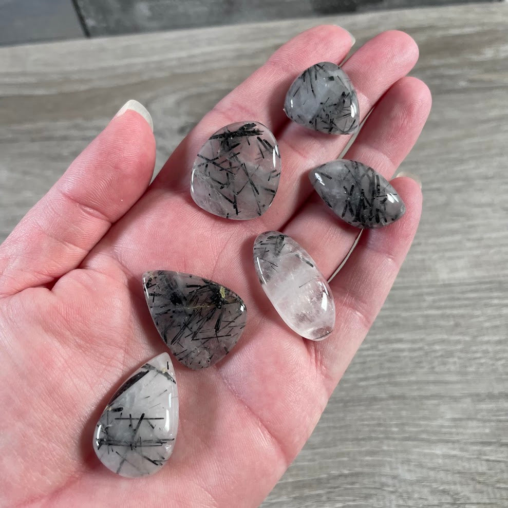 Tourmalinated quartz crystal cabochons for metaphysical shops and handmade designs