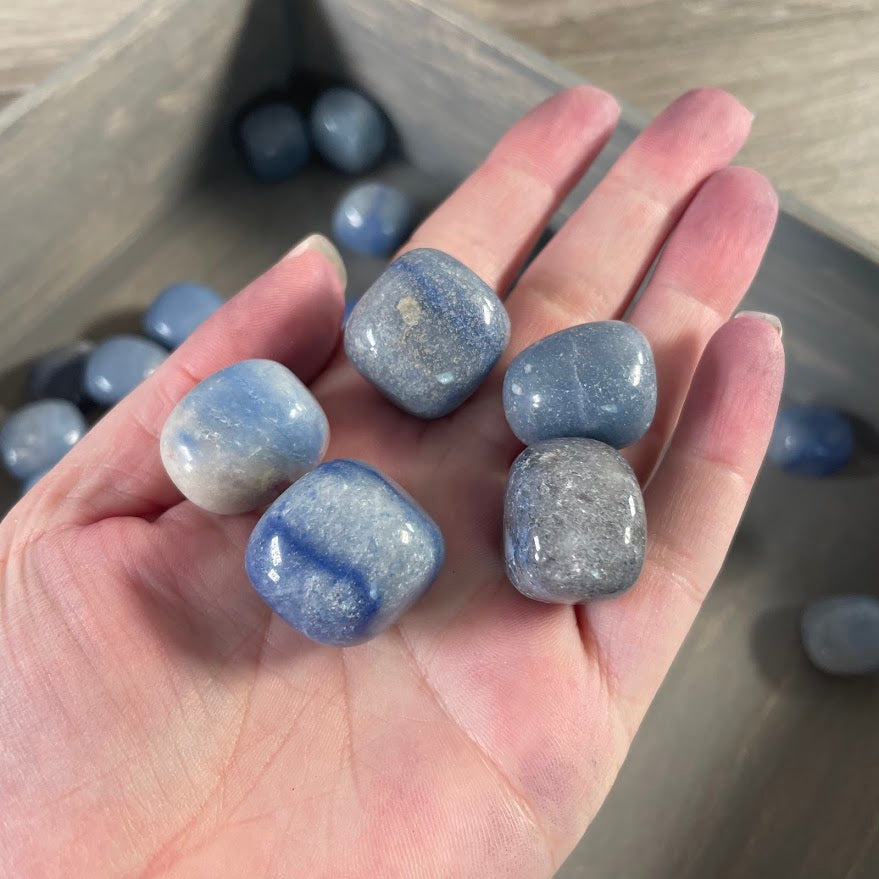 Tumbled blue quartz bulk polished stones for wholesale crystal shops, resale, crafts, and gemstone displays