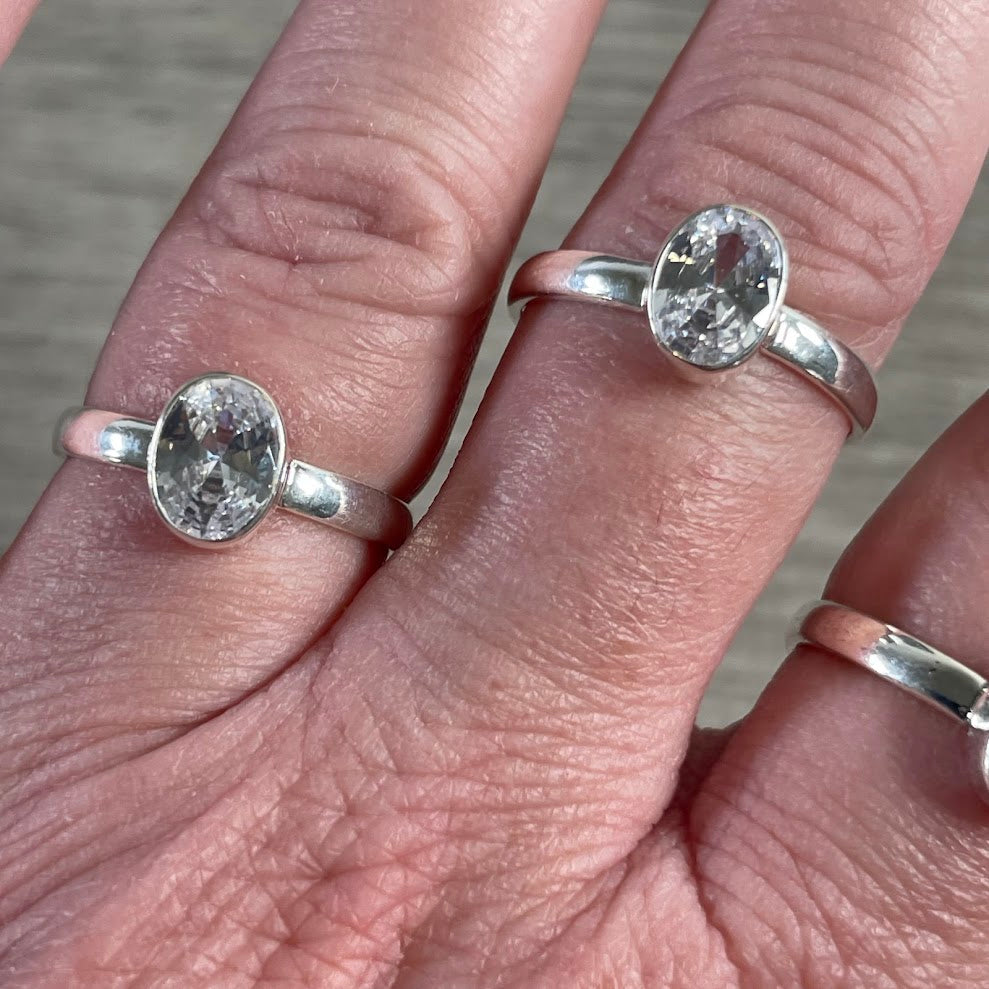 Sterling silver CZ gemstone rings for retail jewelry displays and boutique shops