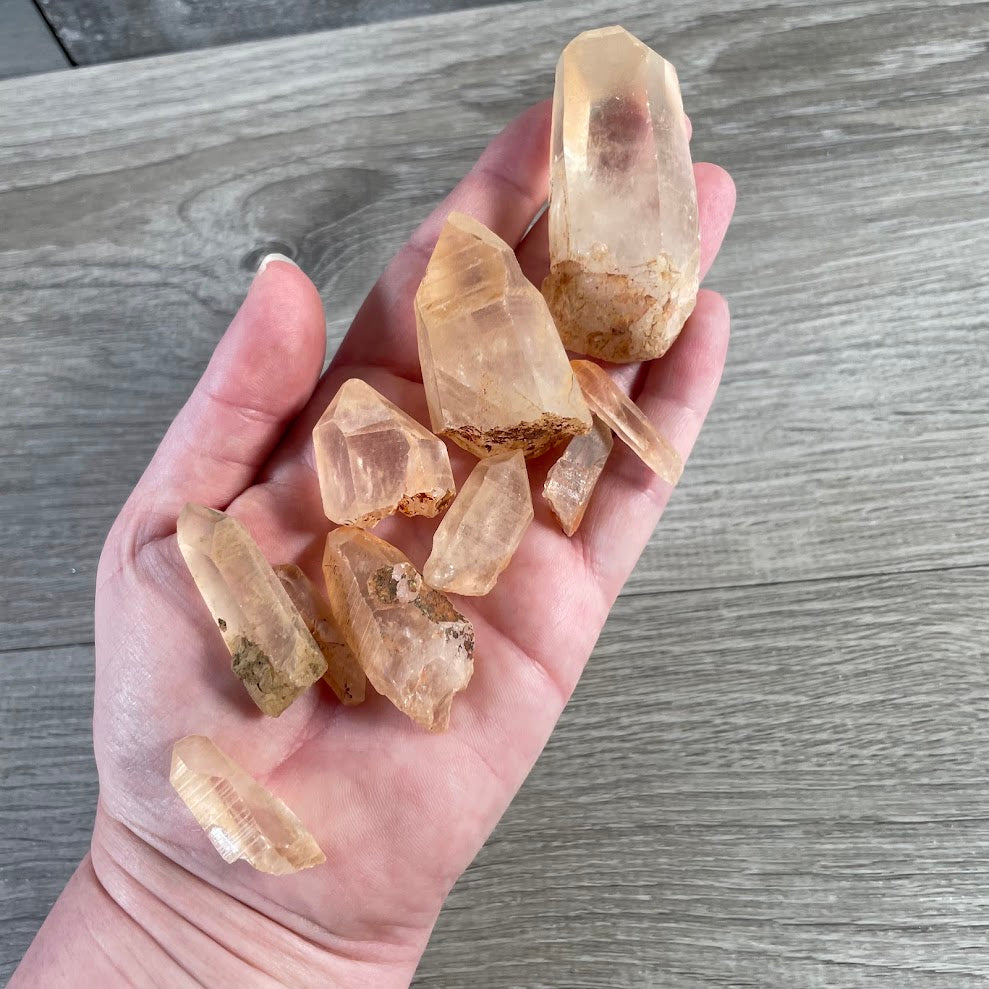 Natural iron-stained Tangerine Quartz points for wholesale crystal shops