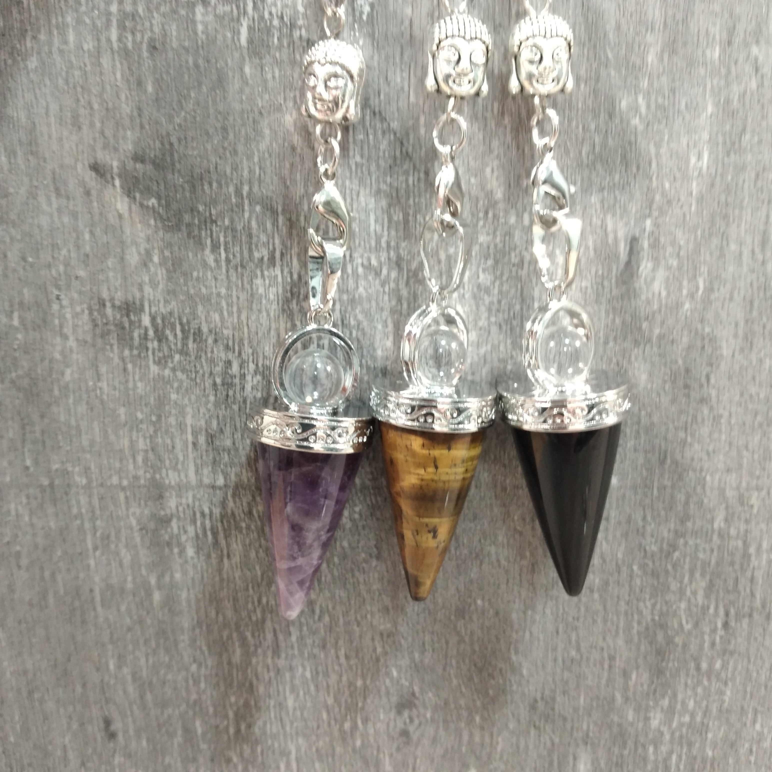 Assorted Ohm Chakra Pendulums