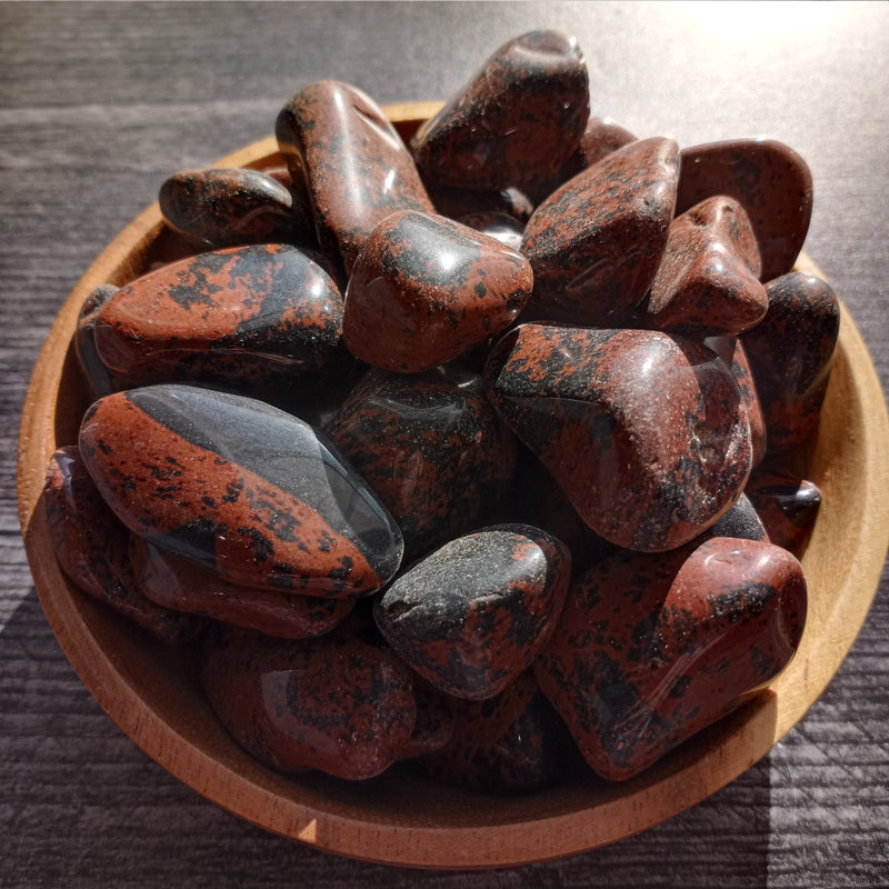 Mahogany Obsidian in a wooden bowl