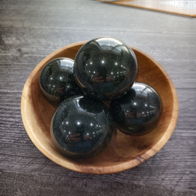 Green Goldstone Spheres