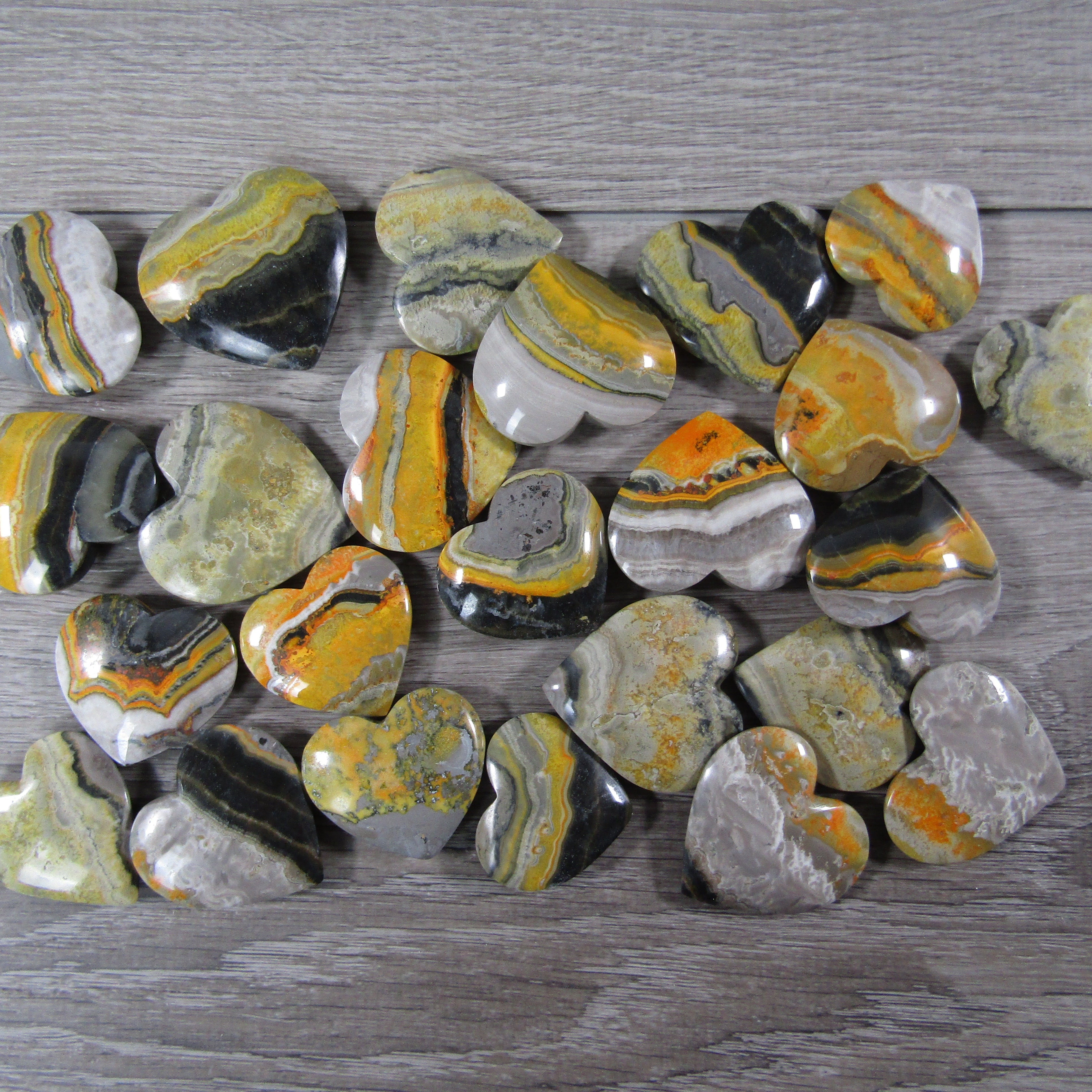 Bumble Bee Jasper heart stone for metaphysical healing and gift resale.