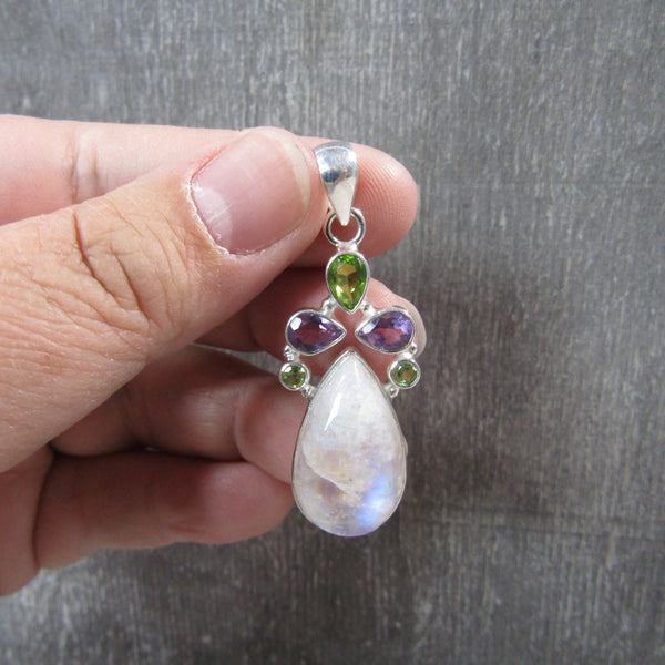 rainbow moonstone teardrop pendant with peridot and iolite stones in sterling silver