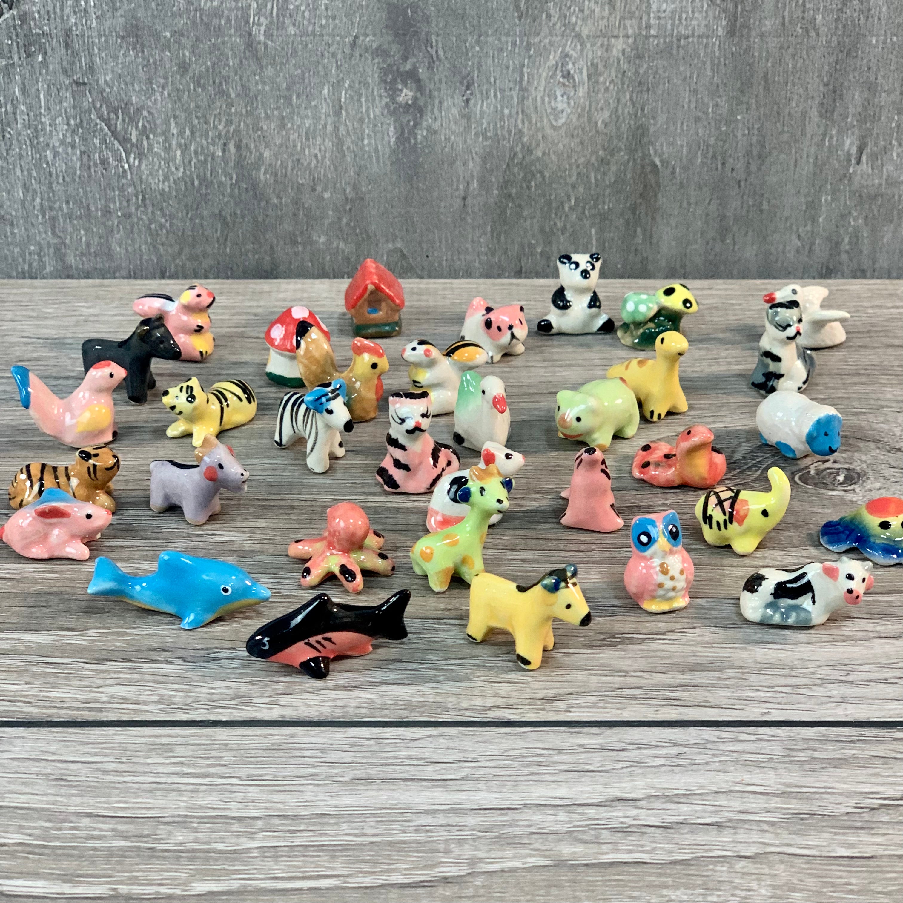 Assorted Mini Ceramic Figurines 1" set of 50