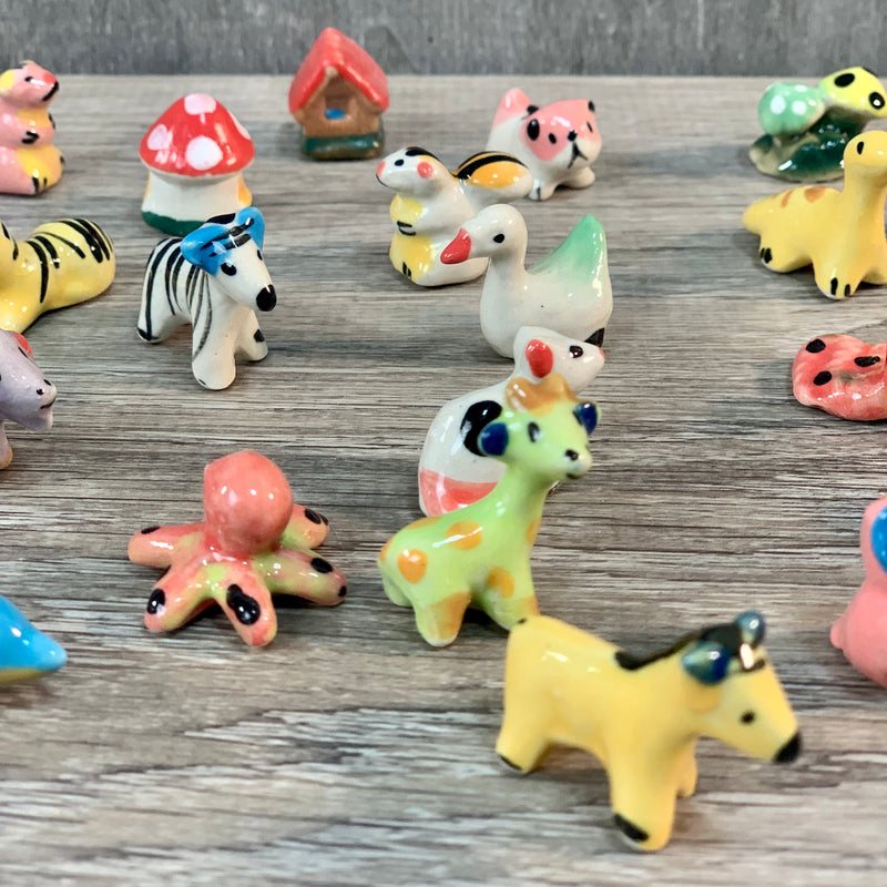 Assorted Mini Ceramic Figurines 1" set of 50