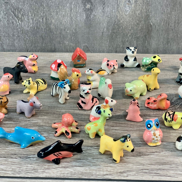 Assorted Mini Ceramic Figurines 1" set of 50