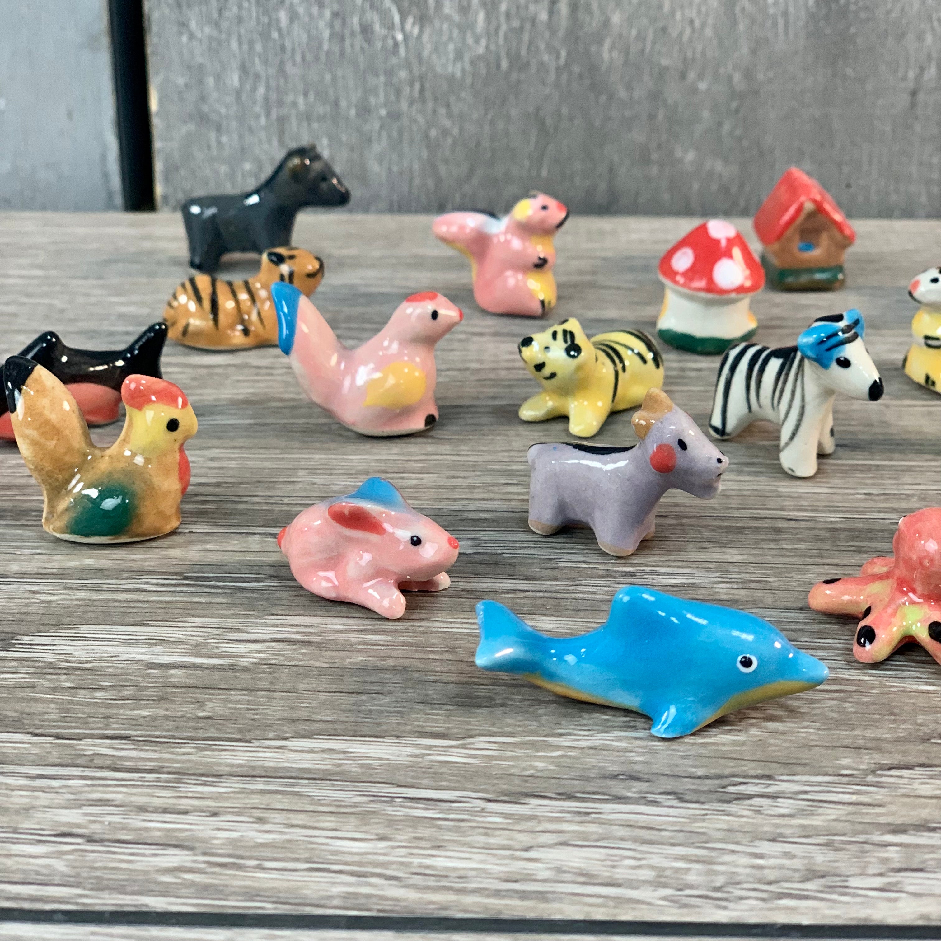 Assorted Mini Ceramic Figurines 1" set of 50