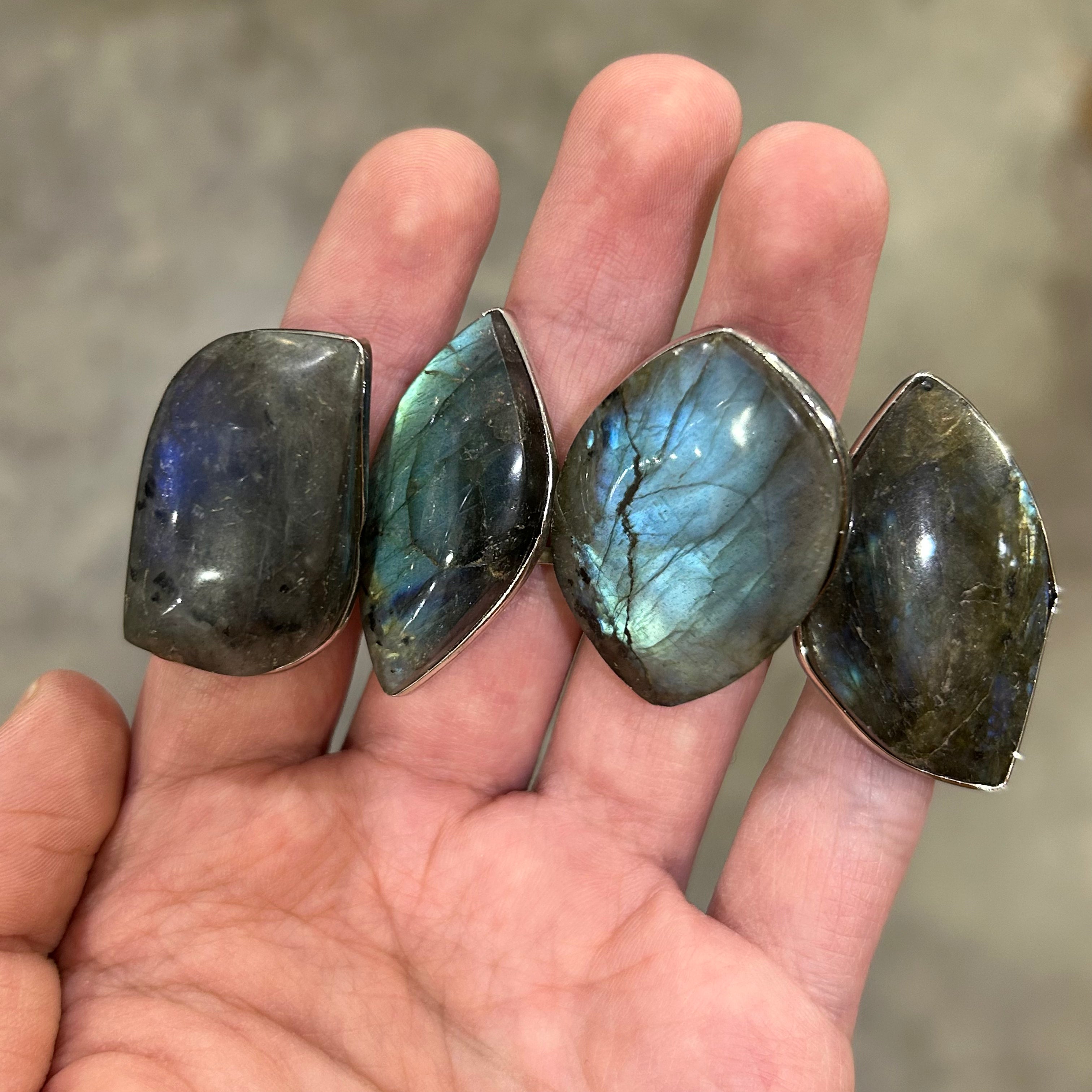 Natural labradorite crystal ring with adjustable band for boutique jewelry and gemstone shops